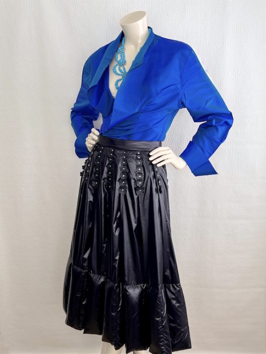 RARE Moncler down-filled pleated skirt, leather details