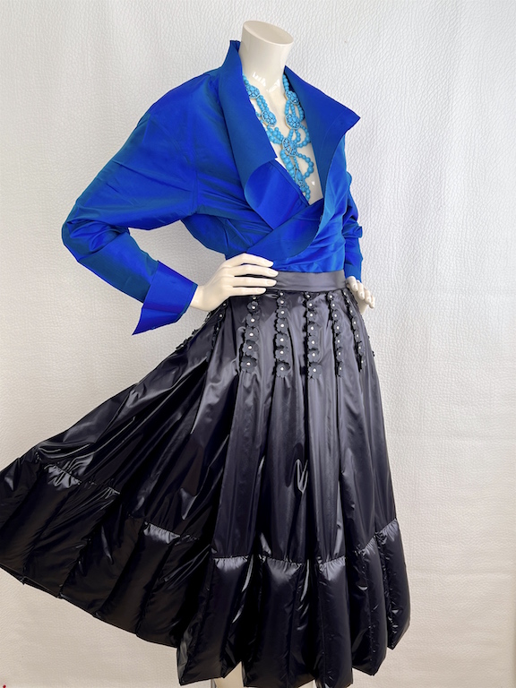 RARE Moncler down-filled pleated skirt, leather details