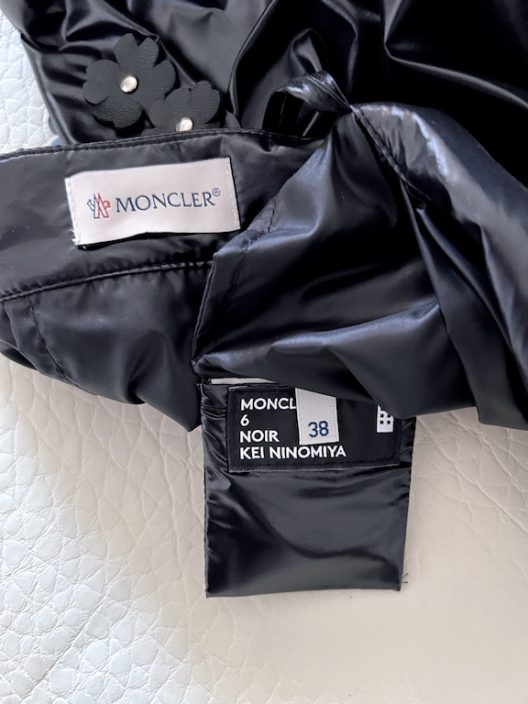 RARE Moncler down-filled pleated skirt, leather details