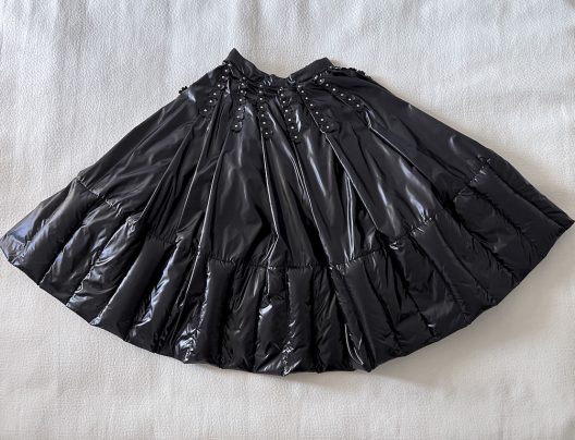 RARE Moncler down-filled pleated skirt, leather details
