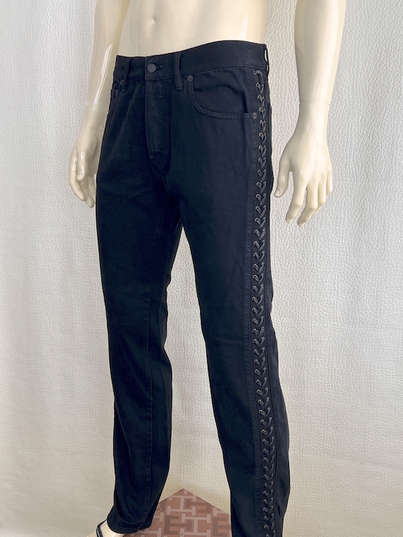 Alexander McQueen black jean with adjustable straps on the sides