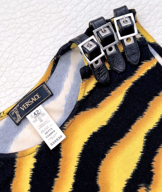 Versace animal print top with leather straps