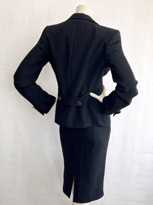 Black double-breasted suit with jewel buttons
